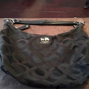 BLACK Coach Purse. Purple interior.
